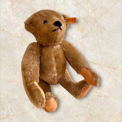 Sale Photo Thumbnail #1366: Steiff Teddy Bear West Germany 14" Long, Wool and Cotton, excellent condition but for a little smudge of dirt on back of head as shown in photo