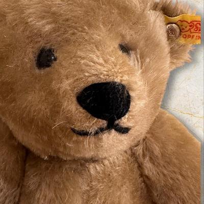 Sale Photo Thumbnail #1368: Steiff Teddy Bear West Germany 14" Long, Wool and Cotton, excellent condition but for a little smudge of dirt on back of head as shown in photo