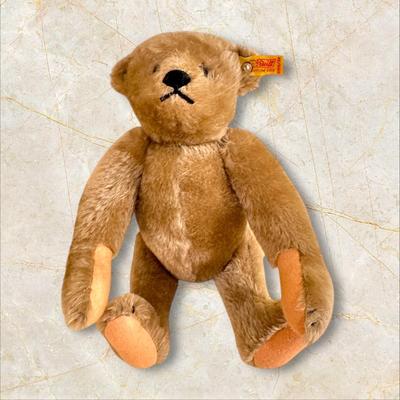 Sale Photo Thumbnail #1365: Steiff Teddy Bear West Germany 14" Long, Wool and Cotton, excellent condition but for a little smudge of dirt on back of head as shown in photo