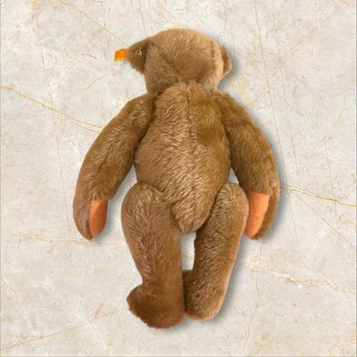 Sale Photo Thumbnail #1370: Steiff Teddy Bear West Germany 14" Long, Wool and Cotton, excellent condition but for a little smudge of dirt on back of head as shown in photo