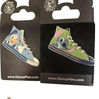 Lot of Disney Pins +Goofy Note Pad