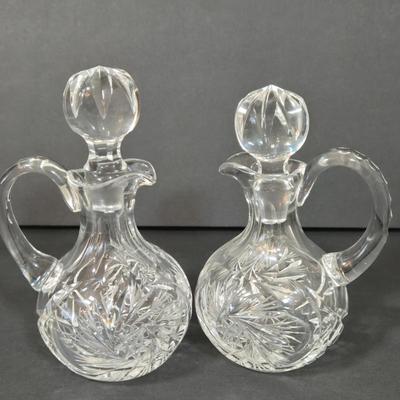 LOT 103D: Crystal Butter Dish, Nut Dish, Syrup Pitcher, Salt and Pepper Shakers, Oil and Vinegar Cruets, and Cordial Glasses