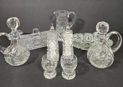 LOT 103D: Crystal Butter Dish, Nut Dish, Syrup Pitcher, Salt and Pepper Shakers, Oil and Vinegar Cruets, and Cordial Glasses