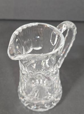LOT 103D: Crystal Butter Dish, Nut Dish, Syrup Pitcher, Salt and Pepper Shakers, Oil and Vinegar Cruets, and Cordial Glasses
