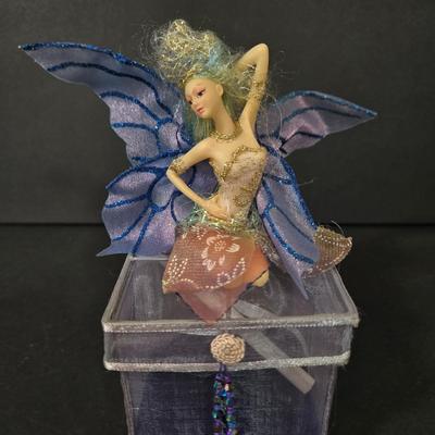 LOT 117D: Glass Vanity Box, Clown Figurine, Dolphin Figurine, and More