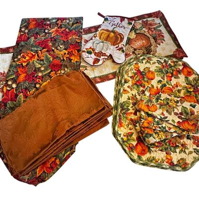 Sale Photo Thumbnail #24: Thanksgiving / Autumn Table Decor
 Table Runners 68" (thick and gold sparkly) and 80" (cotton)
8 brown floral cloth napkins
Set of 4 matching fabric tablecloths and napkins
Gather kitchen mitt