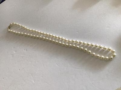 Vintage Knotted Barrel Clasp Pearl like Necklace. Nice