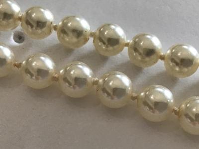 Vintage Knotted Barrel Clasp Pearl like Necklace. Nice