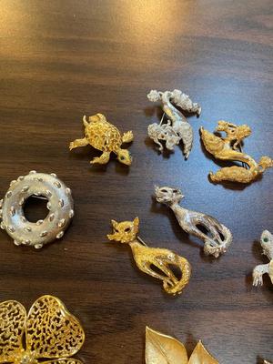 Assorted Costume Jewelry Brooch Lot. Trifari, Monet, Craft ++++