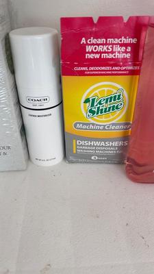 A BUCKET AND AN ARRAY OF DIFFERENT CLEANING PRODUCTS