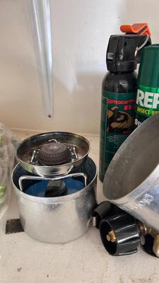 A JETBOIL ALONG WITH BUG AND BEAR REPELLENT, MATCHES, A VARIETY OF DIFFERENT ROPE AND MORE