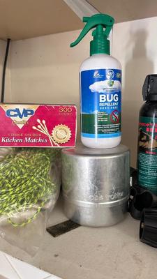 A JETBOIL ALONG WITH BUG AND BEAR REPELLENT, MATCHES, A VARIETY OF DIFFERENT ROPE AND MORE
