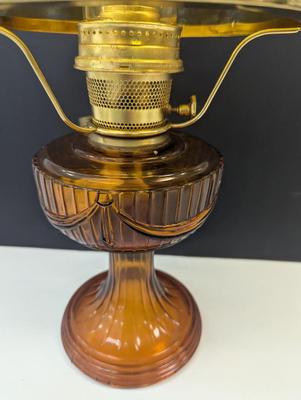 Sale Photo Thumbnail #2356: Aladdin Amber Lincoln Draft Drape Lamp