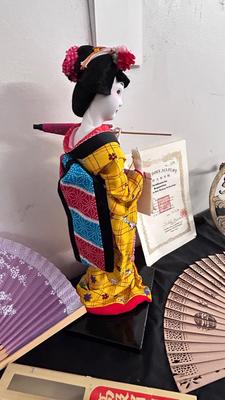 JAPANESE GEISHA DOLL WITH COA AND OTHER ASIAN THEMED ITEMS