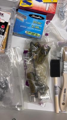 DRAWER PACKED WITH A VARIETY OF DIFFERENT HARDWARE