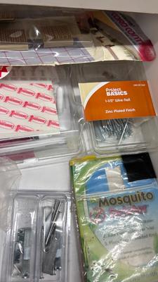 DRAWER PACKED WITH A VARIETY OF DIFFERENT HARDWARE