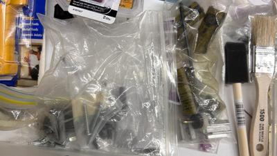 DRAWER PACKED WITH A VARIETY OF DIFFERENT HARDWARE