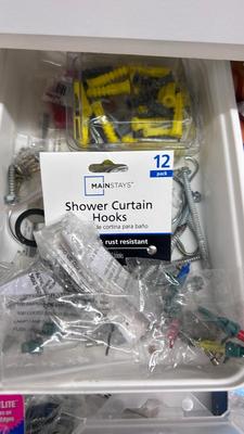 DRAWER PACKED WITH A VARIETY OF DIFFERENT HARDWARE