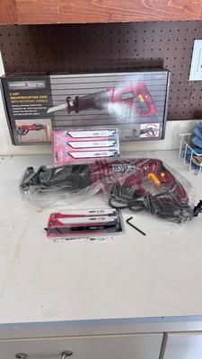 6AMP CHICAGO ELECTRIC RECIPROCATING SAW WITH ROTATING HANDLE, AND NEW BLADES