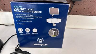 WESTINGHOUSE OUTDOOR SECURITY MOTION, LIGHT TABLE, LAMP, AND POWER STRIP