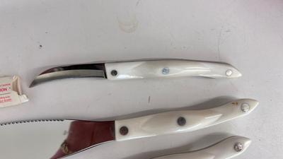 CUTCO KNIVES, A PORCELAIN JUICER, COOKIE CUTTERS AND OTHER HANDY UTENSILS