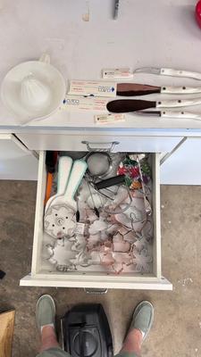 CUTCO KNIVES, A PORCELAIN JUICER, COOKIE CUTTERS AND OTHER HANDY UTENSILS