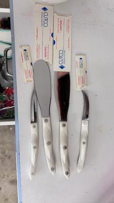 CUTCO KNIVES, A PORCELAIN JUICER, COOKIE CUTTERS AND OTHER HANDY UTENSILS