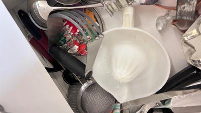 CUTCO KNIVES, A PORCELAIN JUICER, COOKIE CUTTERS AND OTHER HANDY UTENSILS