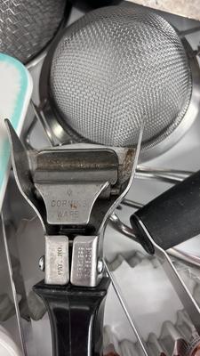 CUTCO KNIVES, A PORCELAIN JUICER, COOKIE CUTTERS AND OTHER HANDY UTENSILS