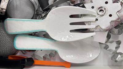 CUTCO KNIVES, A PORCELAIN JUICER, COOKIE CUTTERS AND OTHER HANDY UTENSILS