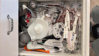 CUTCO KNIVES, A PORCELAIN JUICER, COOKIE CUTTERS AND OTHER HANDY UTENSILS