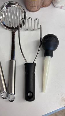 AN EXCELLENT ASSORTMENT OF UTENSILS