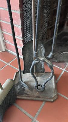 HAMMERED MEDALLION ANDIRONS AND MATCHING FIREPLACE TOOLS