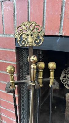 HAMMERED MEDALLION ANDIRONS AND MATCHING FIREPLACE TOOLS