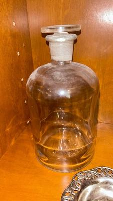APOTHECARY JAR, CANDLE HOLDER, PEWTER DISH, ANTIQUE IRON STAND AND OTHER IRON DOODAD