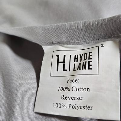 LOT 206H: Two XL and One Smaller Sized Throw Pillows