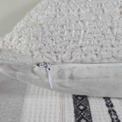 LOT 206H: Two XL and One Smaller Sized Throw Pillows