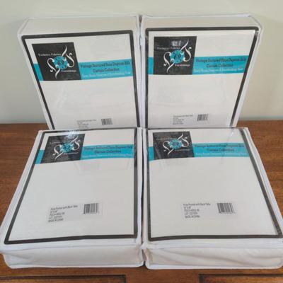 LOT 222H: New in Package Four Curtain Panels