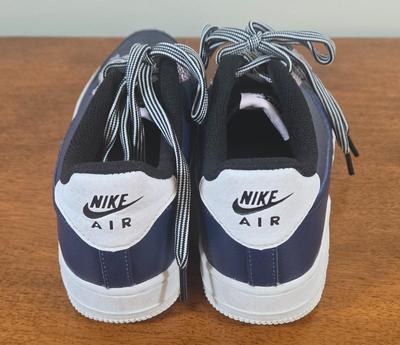 LOT 225W: Two Pairs of Nike Sneakers