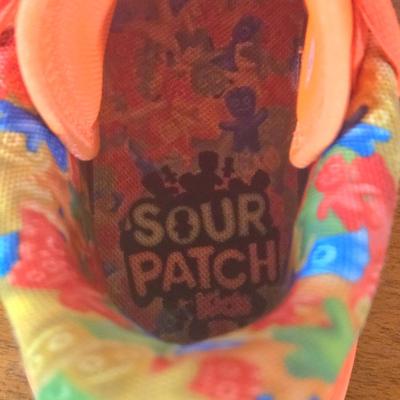 LOT 226W: Nike Sneakers and Under Armour Sour Patch Kids Sneakers