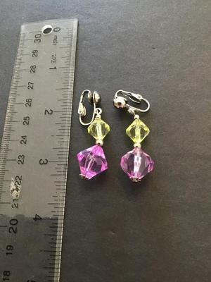 Clip on dangle earrings with faceted yellow and purple beads