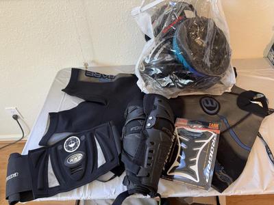 Sale Photo Thumbnail #43: Wet suit 
Shin guards
Helmets 
Tank protector