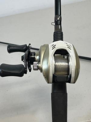 LOT 75: Fishing Rod with Okuma Stratus V Baitcaster Reel + Additional Reel