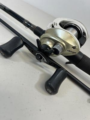 LOT 75: Fishing Rod with Okuma Stratus V Baitcaster Reel + Additional Reel
