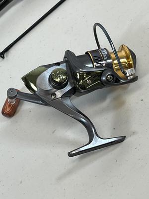 LOT 75: Fishing Rod with Okuma Stratus V Baitcaster Reel + Additional Reel