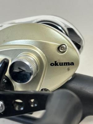 LOT 75: Fishing Rod with Okuma Stratus V Baitcaster Reel + Additional Reel