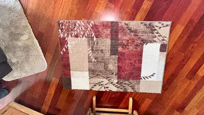 GLIDER WITH OTTOMAN, KNITTED THROW AND RUG