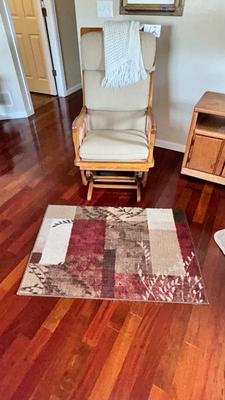 GLIDER WITH OTTOMAN, KNITTED THROW AND RUG