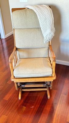 GLIDER WITH OTTOMAN, KNITTED THROW AND RUG