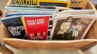 2 CHAIRS AND A MAGAZINE RACK PACKED WITH REMINENCSE, SMITHSONIAN, AND OTHER MAGAZINES